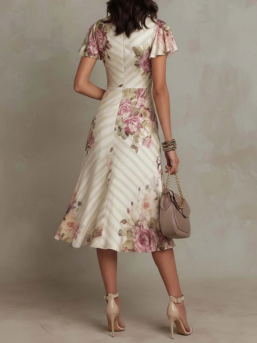 Elena | Abito midi vintage in raso con fantasia floreale