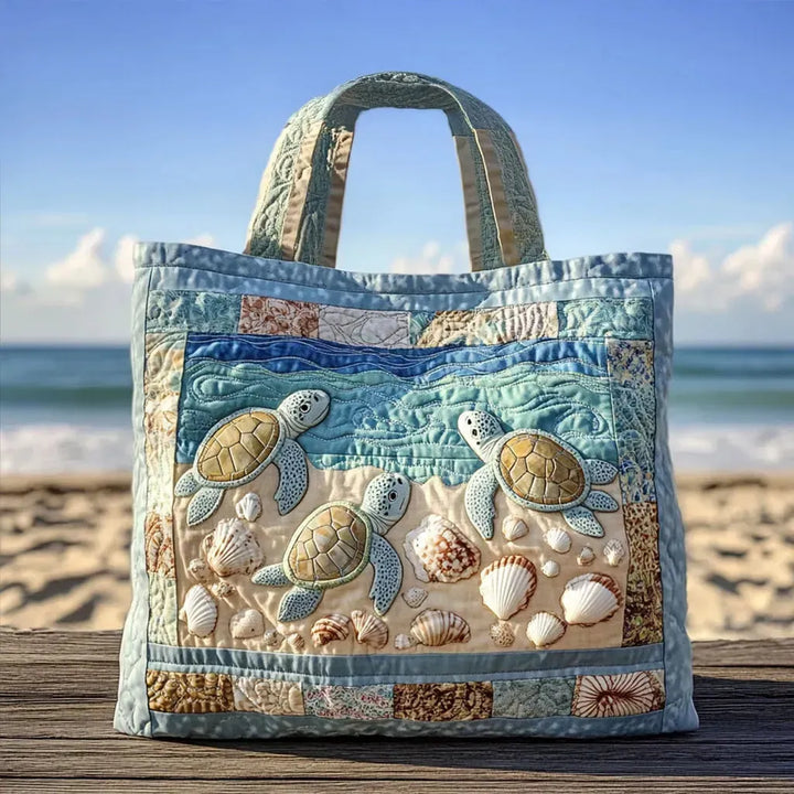 Luisa | Borsa trapuntata con tartarughe marine sulla riva