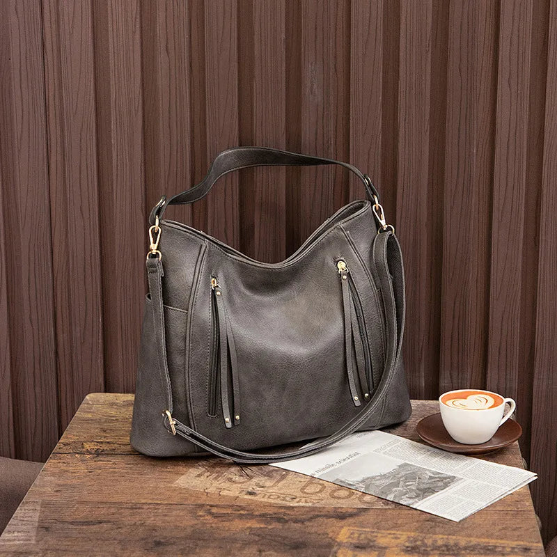 Paola | Borsa in pelle con frange