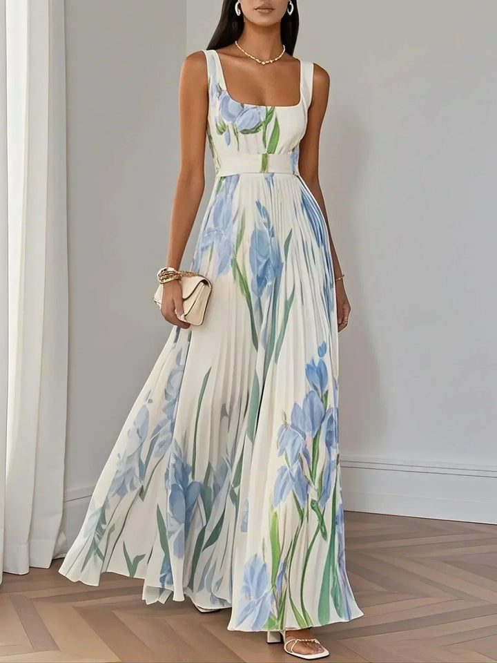 Matilde | Abito lungo bianco plissettato in chiffon a fiori